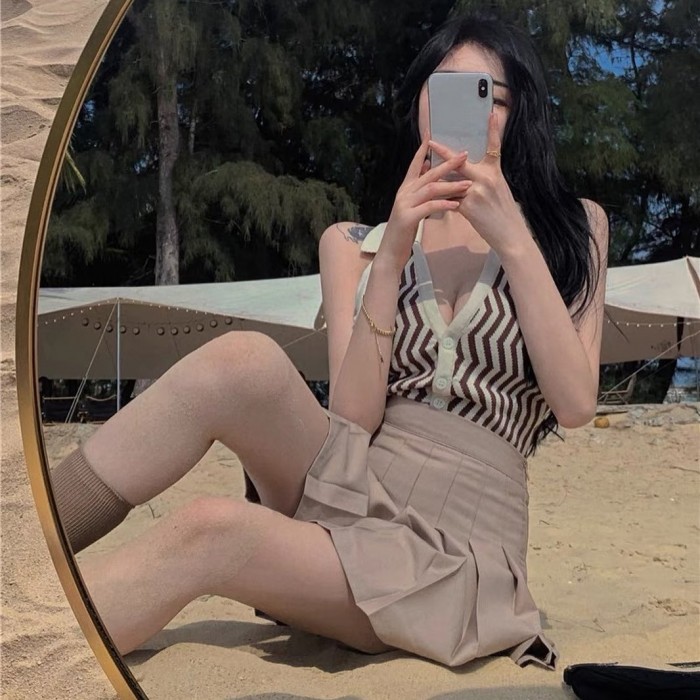 Knitted halter neck top & khaki tennis skirt set wear Knitted halter neck top & khaki tennis skirt set wear