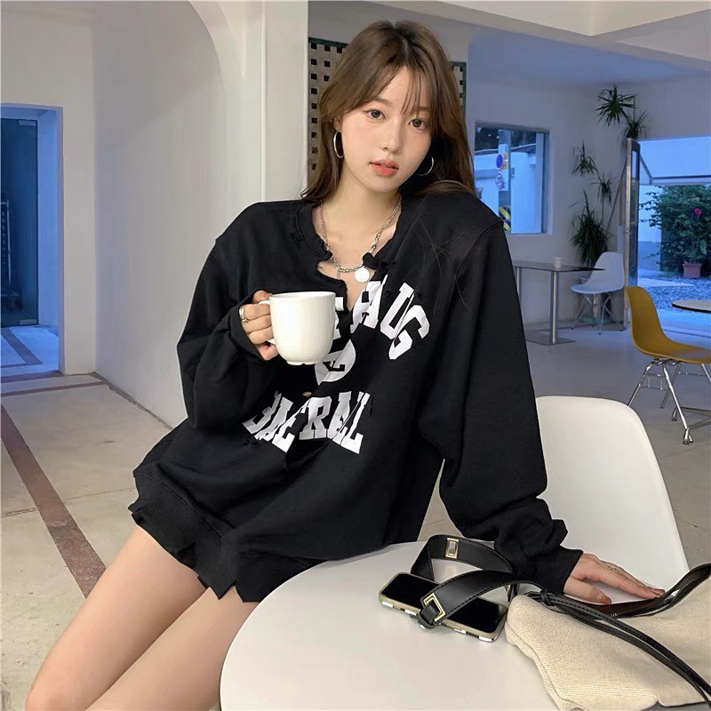 Ripped baseball sweater